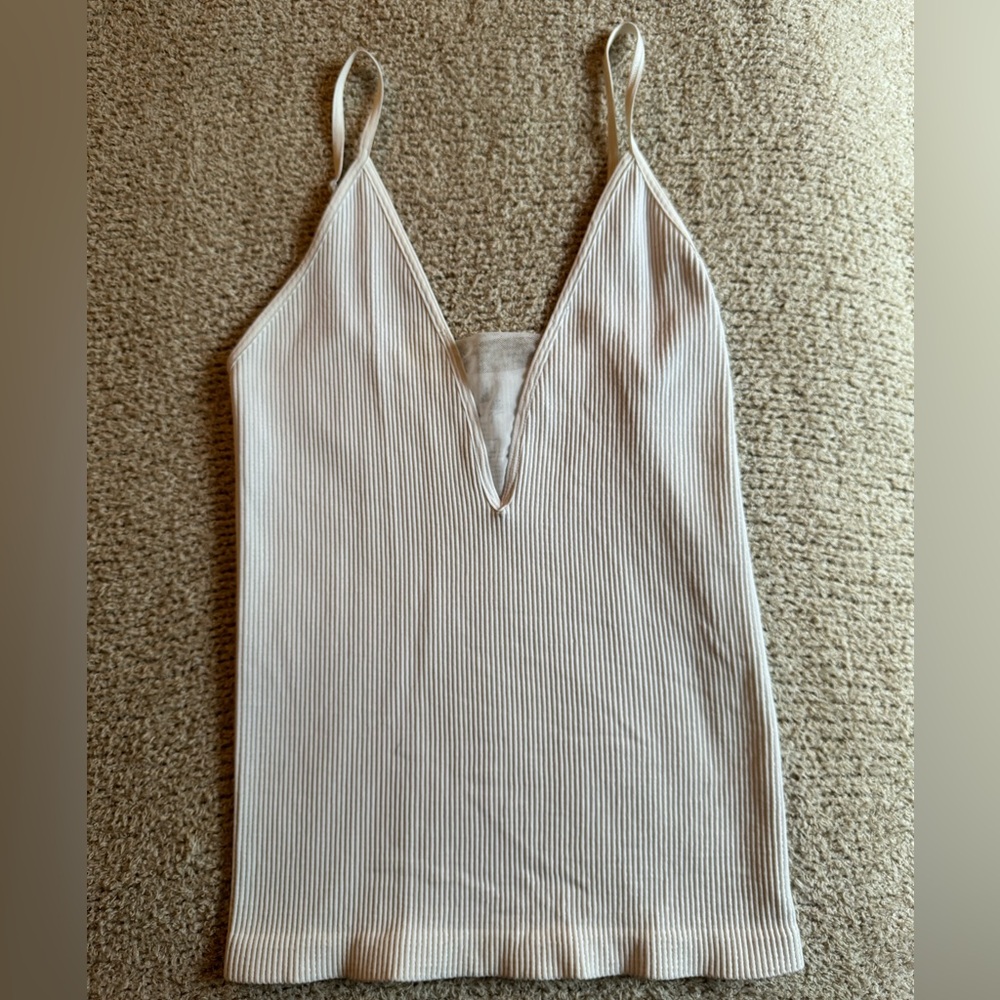 FREE PEOPLE TANK TOP SIZE M/L never worn